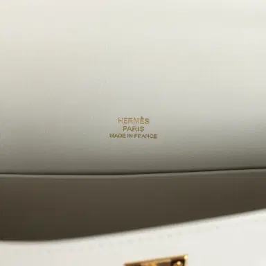HERMÈS Hermes Kelly Pochette White Swift Gold Hardware | Thumbnail 7 HERMÈS Hermes Kelly Pochette White Swift Gold Hardware | Thumbnail 7