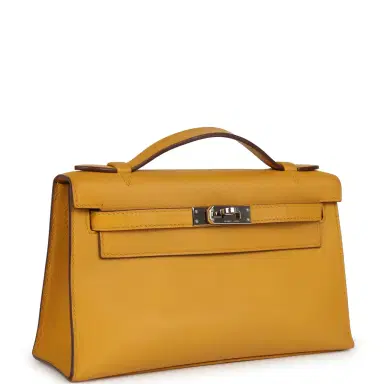HERMÈS Pre-owned Hermes Kelly Pochette Jaune Ambre Swift Palladium Hardware | Thumbnail 2 HERMÈS Pre-owned Hermes Kelly Pochette Jaune Ambre Swift Palladium Hardware | Thumbnail 2
