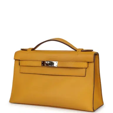 HERMÈS Pre-owned Hermes Kelly Pochette Jaune Ambre Swift Palladium Hardware | Thumbnail 3 HERMÈS Pre-owned Hermes Kelly Pochette Jaune Ambre Swift Palladium Hardware | Thumbnail 3