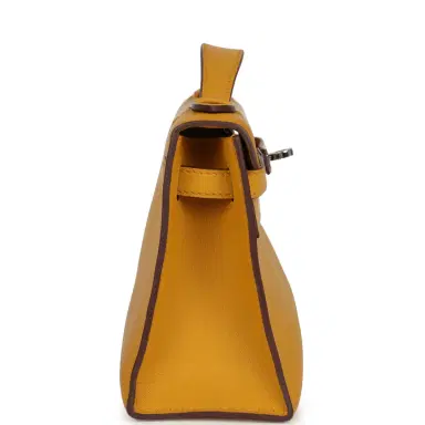 HERMÈS Pre-owned Hermes Kelly Pochette Jaune Ambre Swift Palladium Hardware | Thumbnail 4 HERMÈS Pre-owned Hermes Kelly Pochette Jaune Ambre Swift Palladium Hardware | Thumbnail 4