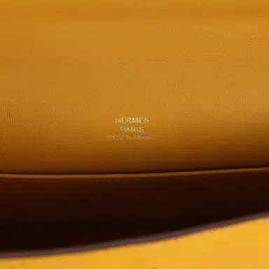 HERMÈS Pre-owned Hermes Kelly Pochette Jaune Ambre Swift Palladium Hardware | Thumbnail 7 HERMÈS Pre-owned Hermes Kelly Pochette Jaune Ambre Swift Palladium Hardware | Thumbnail 7
